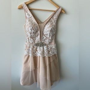Gorgeous cream colored short formal dress with beautiful white lace with gems
